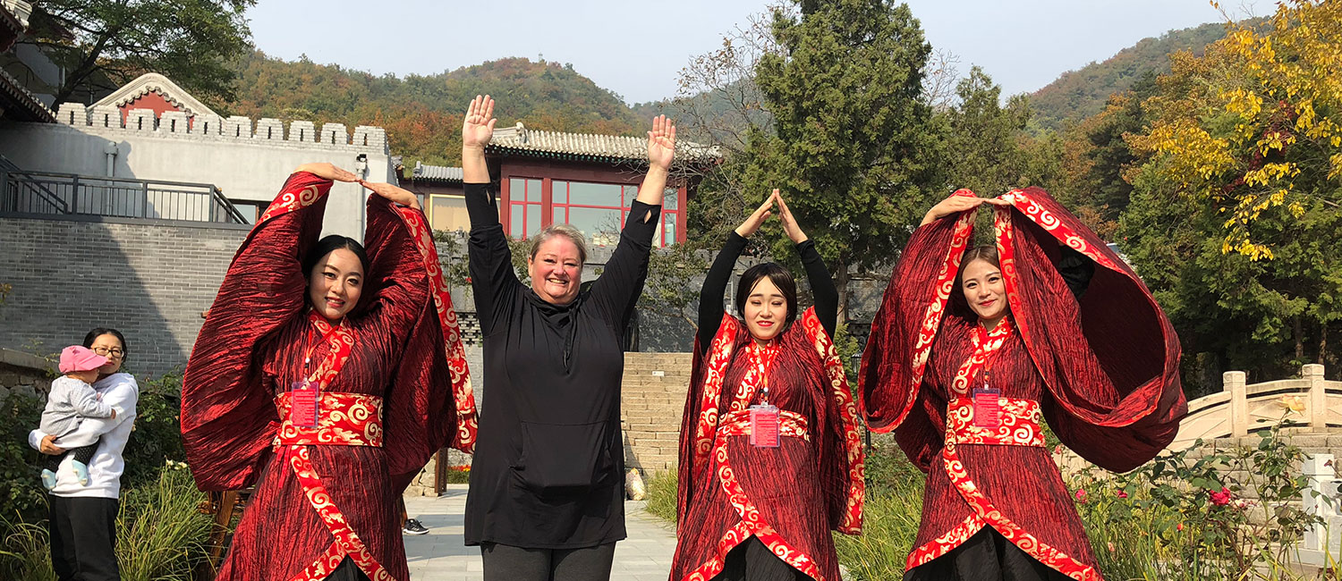 Group of people in China making O-H-I-O