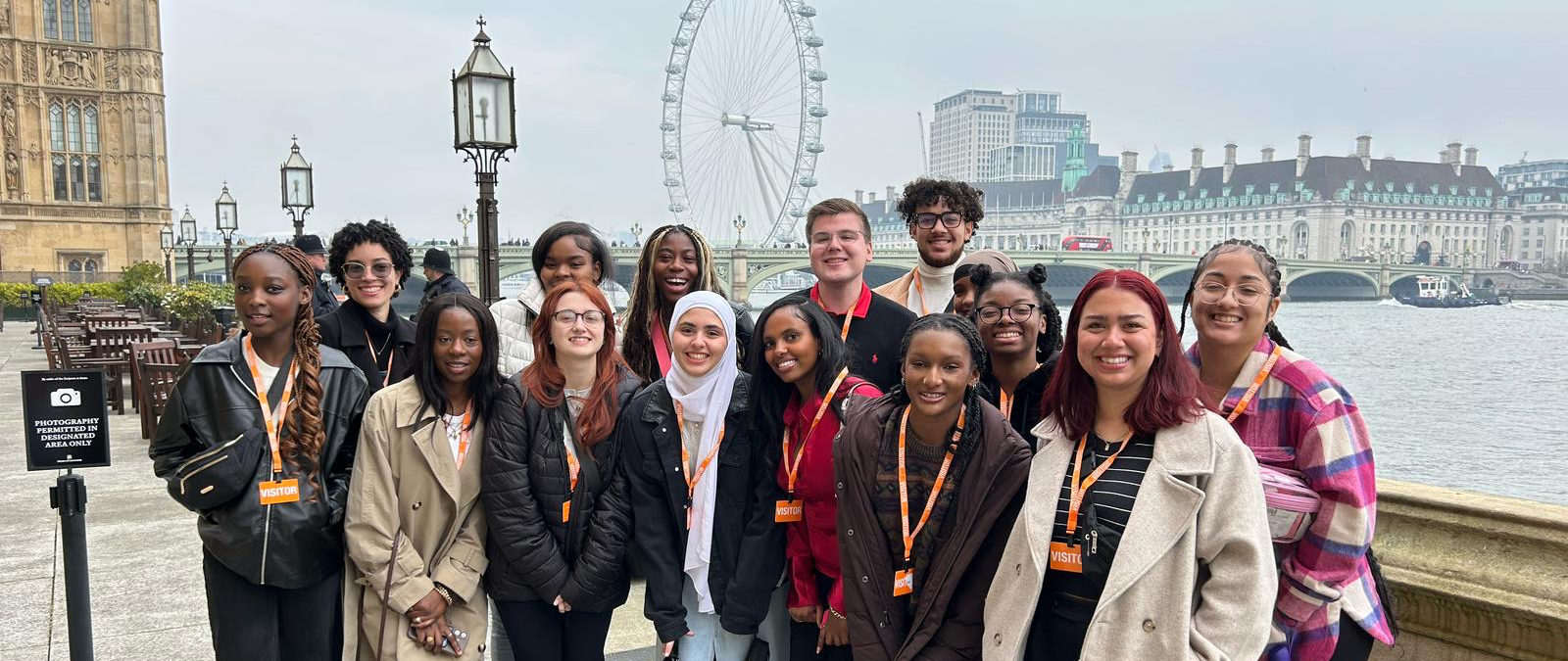 Students gather by Thames River
