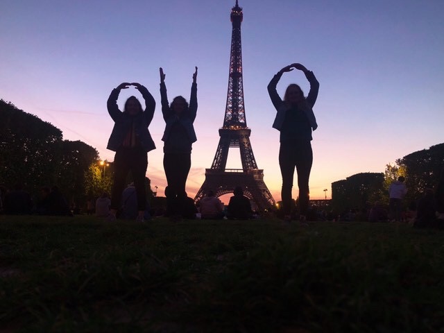 Buckeyes perform an O-H-I-O formation with the Eiffel tower