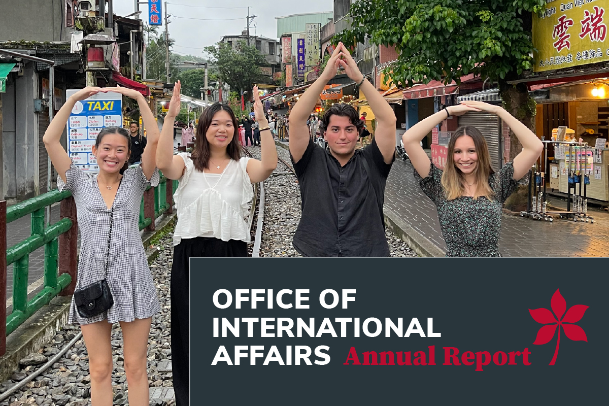 Students in Taiwan making O-H-I-O, Office of International Affairs Annual Report in lower right corner