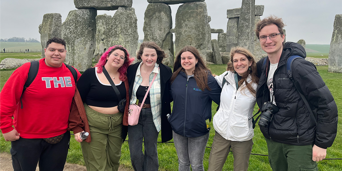 Students and professor at Stonehenge