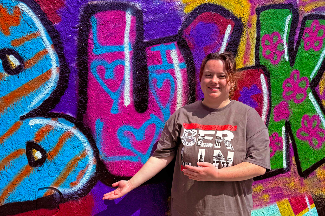 Student at Berlin Wall