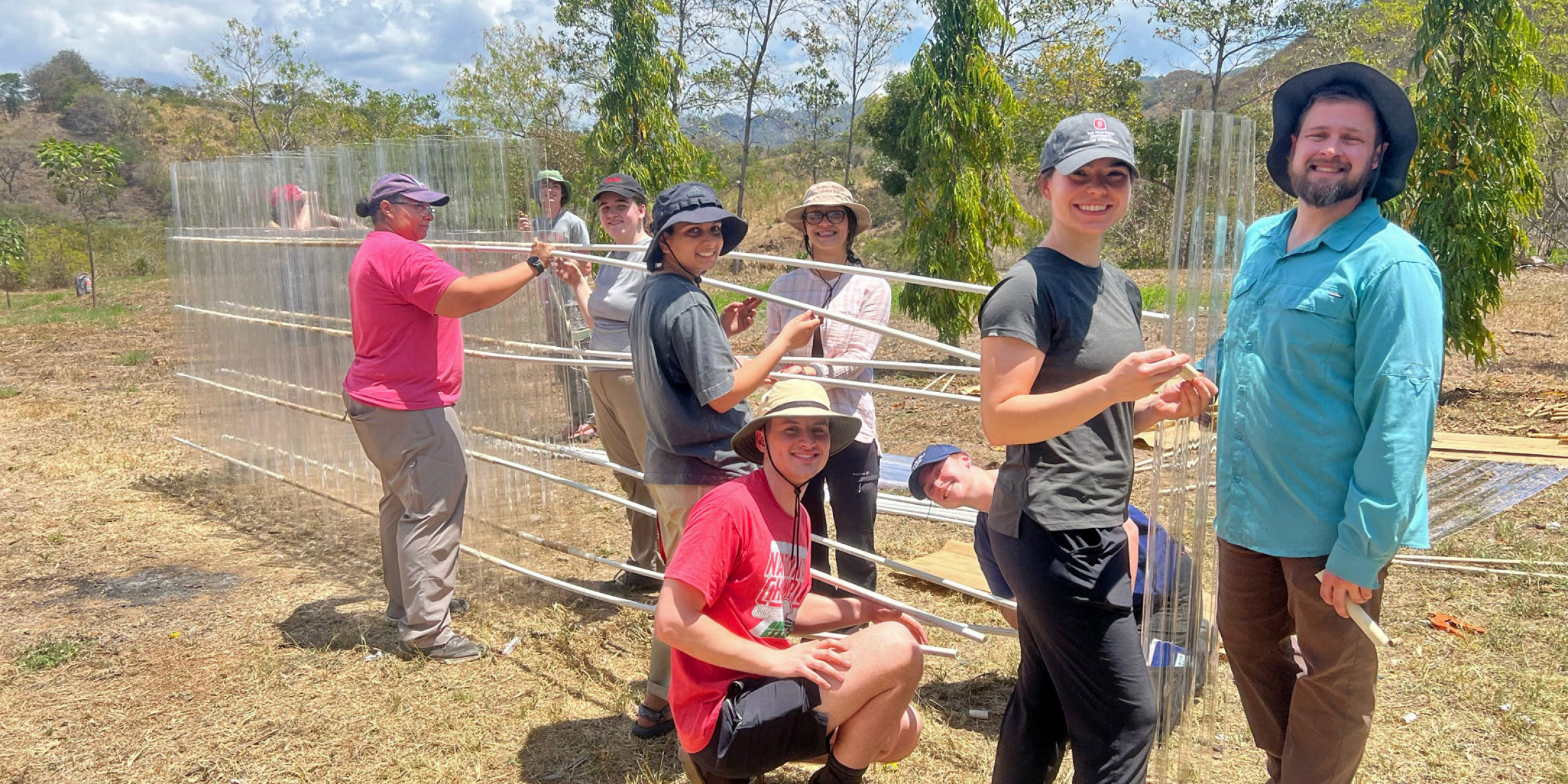 students working on water treatment equipment