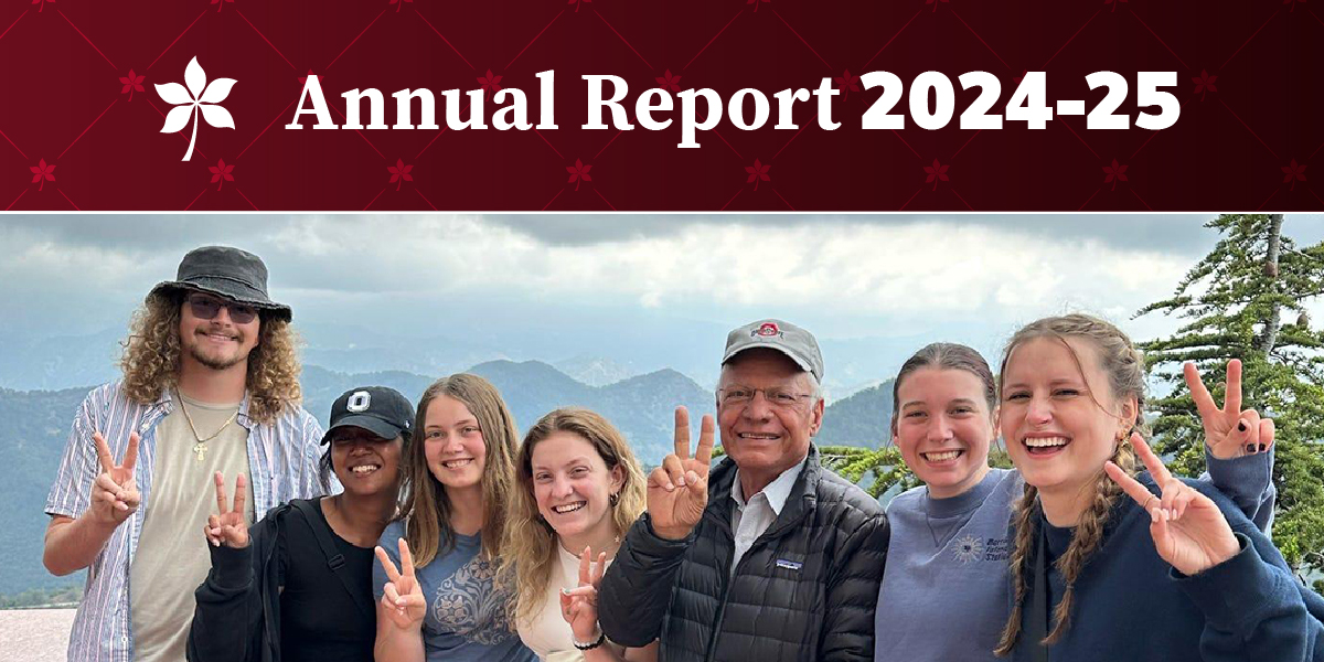 Group of students and Stavros smiling in Cyprus, Annual Report 2024-25 with buckeye leaf