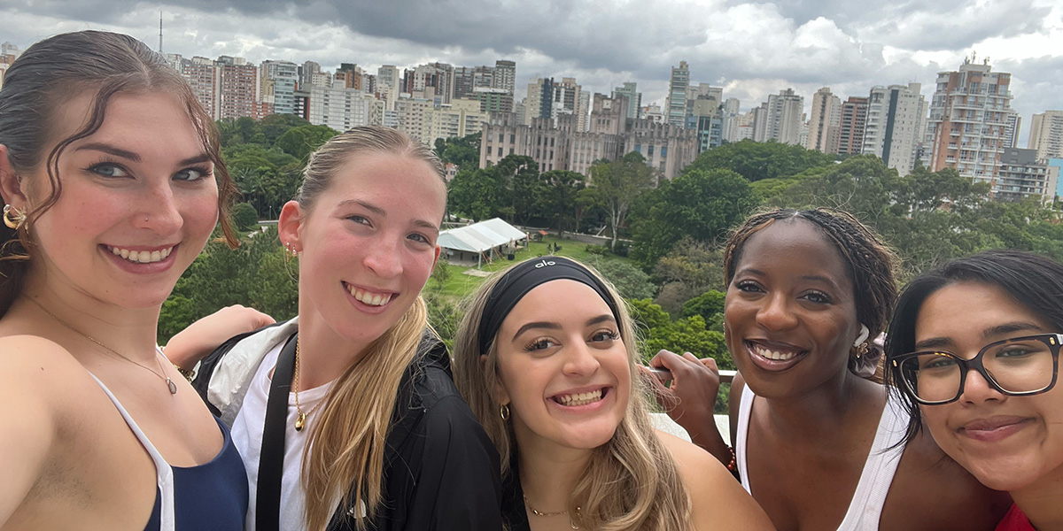 student selfie overlooking Brazilian city