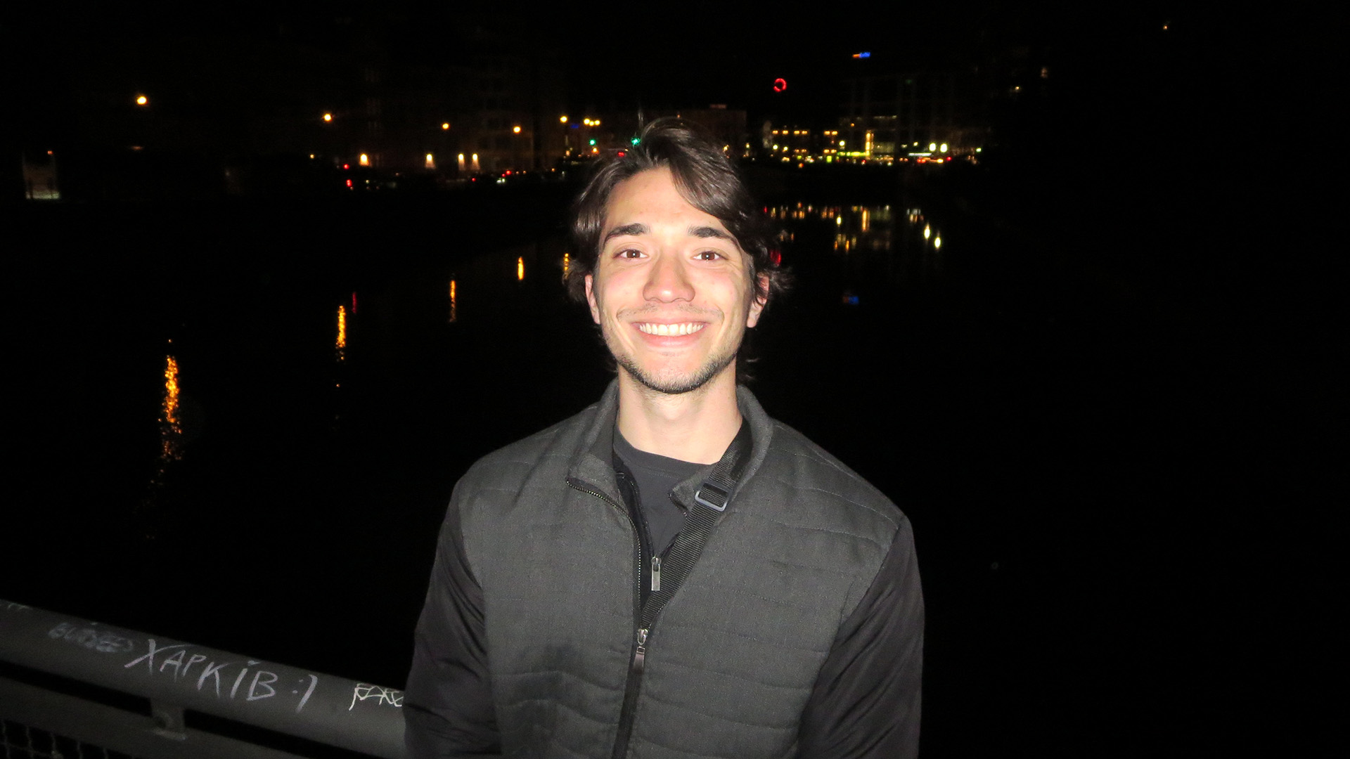 Student near dark bridge