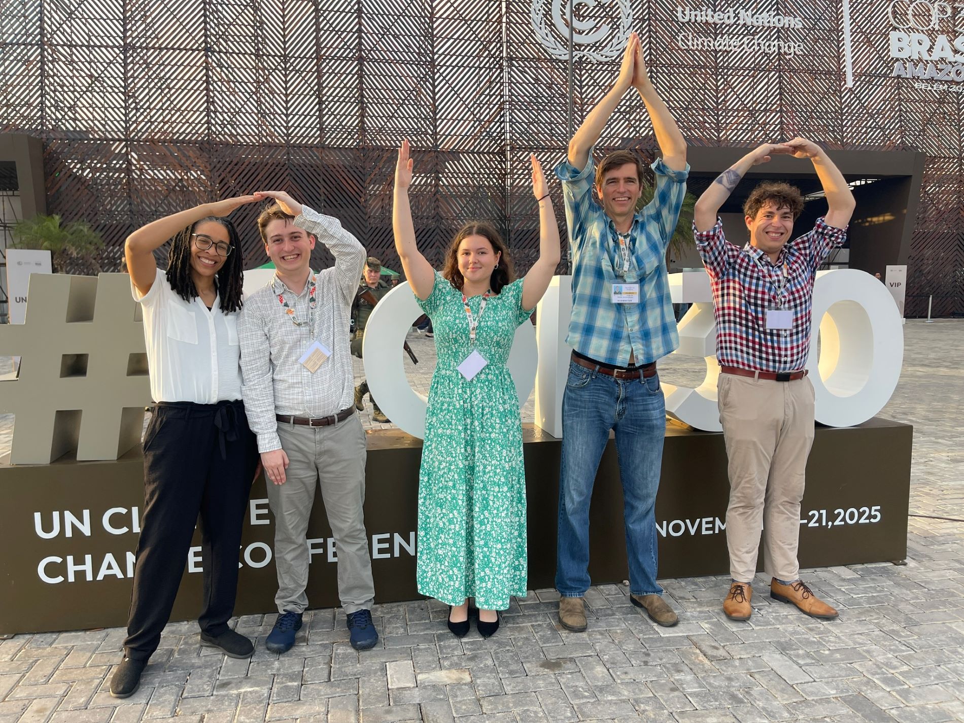 Ohio State students and faculty doing an O-H-I-O cheer in Belem, Brazil.