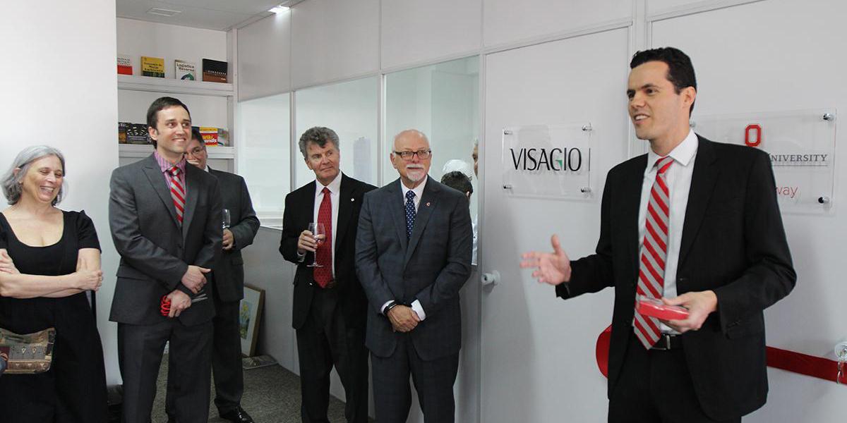 Pimenta speaking at the ribbon cutting ceremony for the Brazil Gateway.