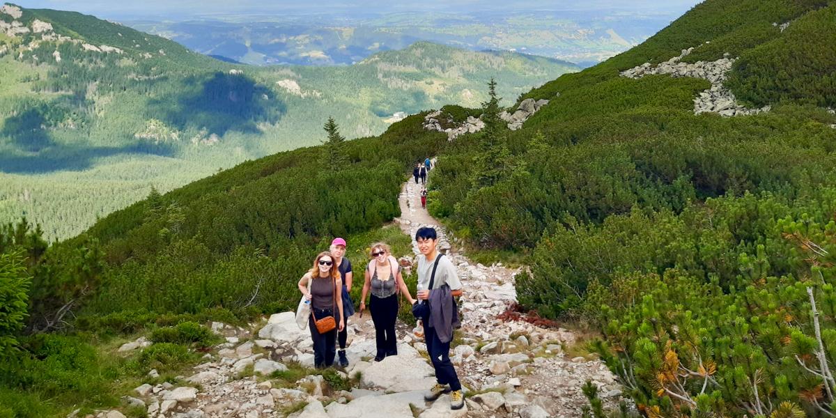 Group of students on a trail of a mountain