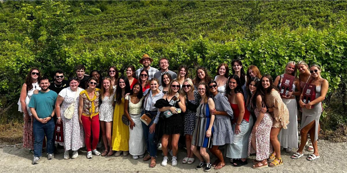 students at a vineyard
