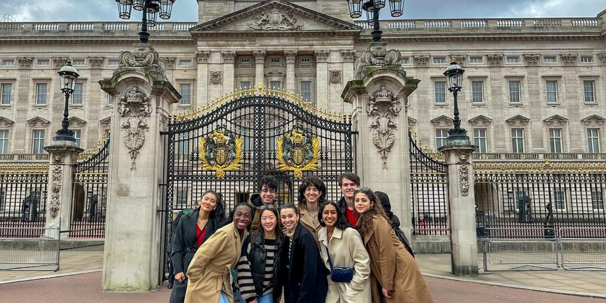 Student in front of Buckingham Palace