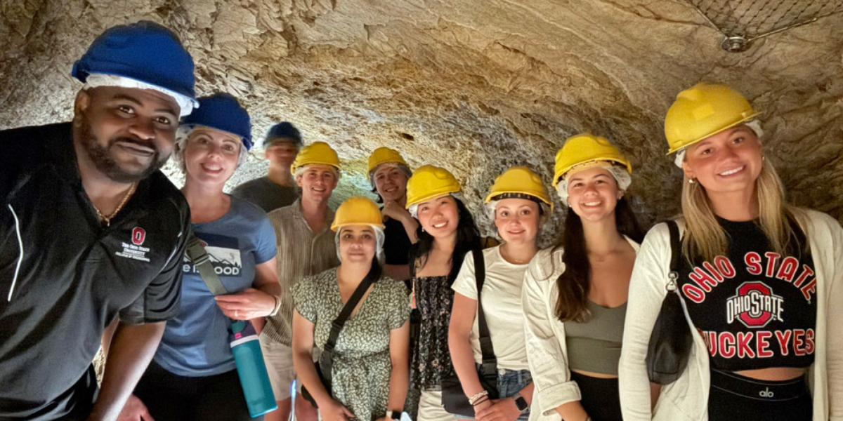 students in a cave