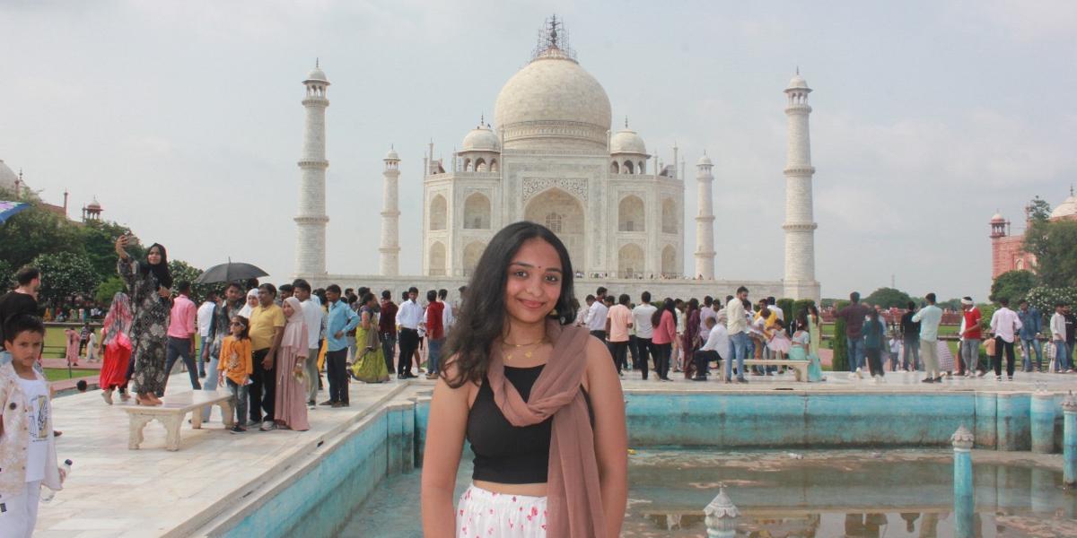 Woman standing in front of building