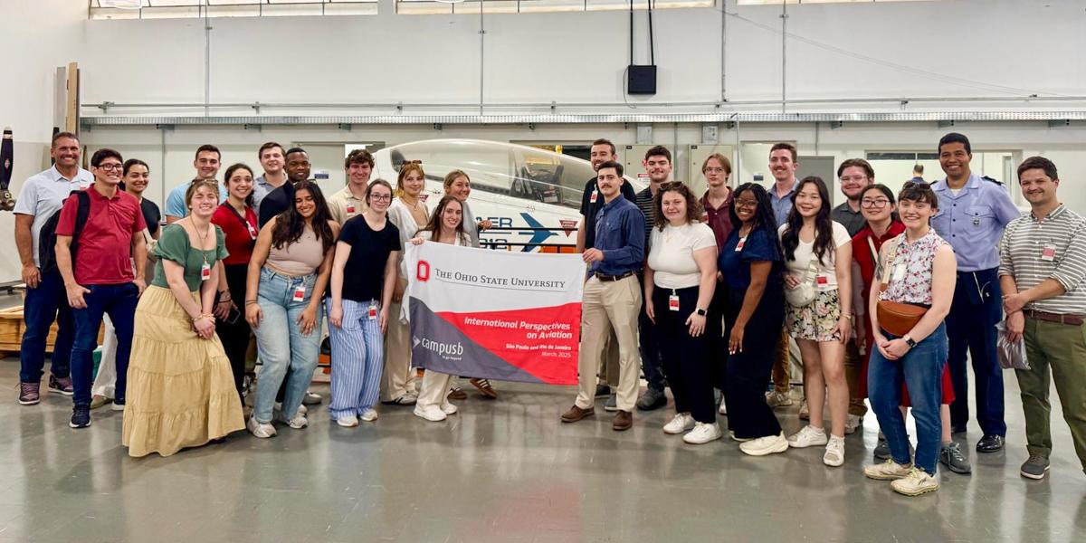 Group in an airplane hangar