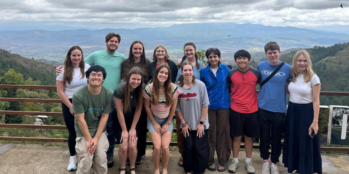 Students posing on an overlook