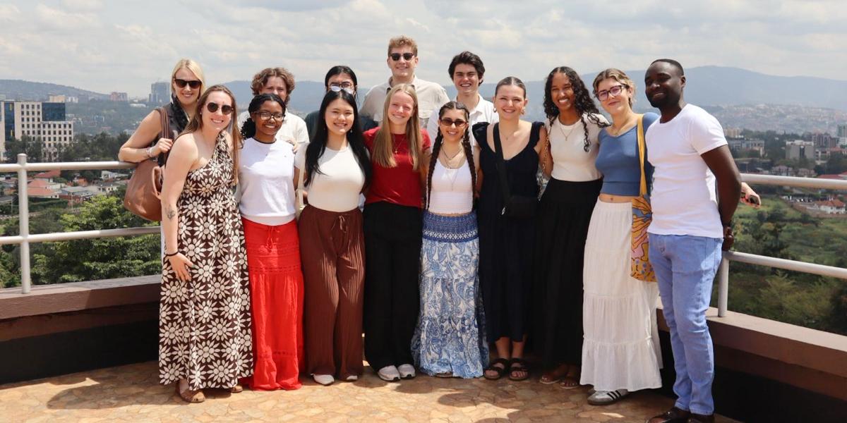 Students outside on a balcony