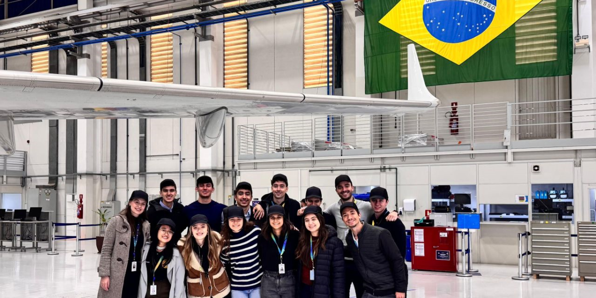 Students at Embraer pose