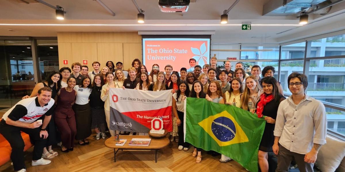 Group of students posing together in a classroom in Brazil