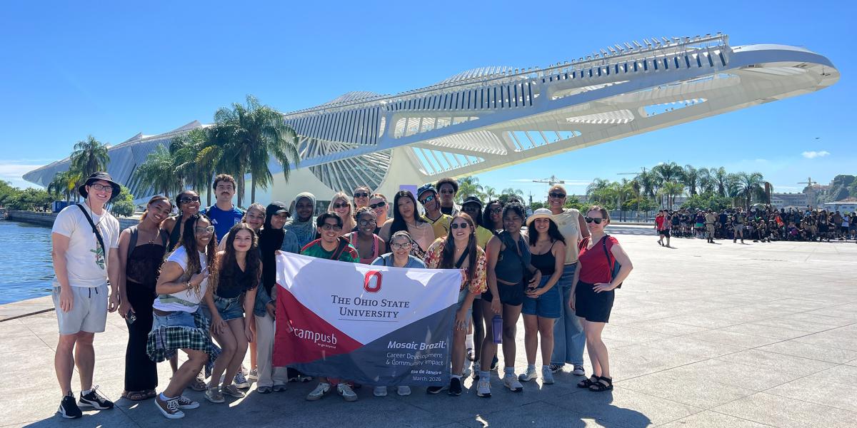 Group of students with a flag