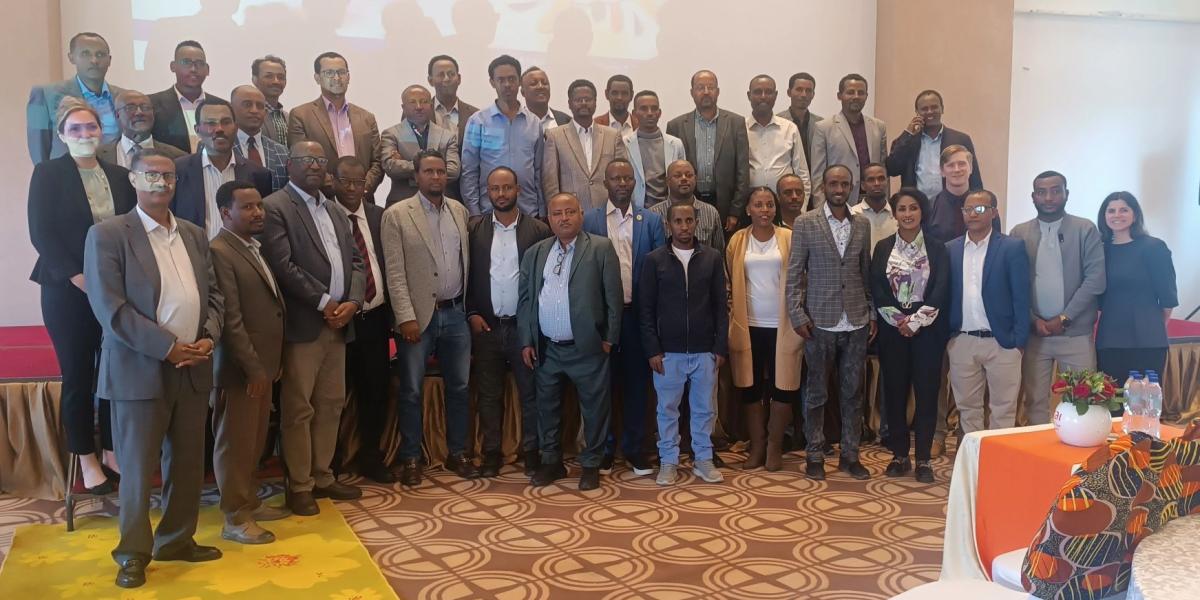 Group photo of people who attended the veterinary medicine conference.
