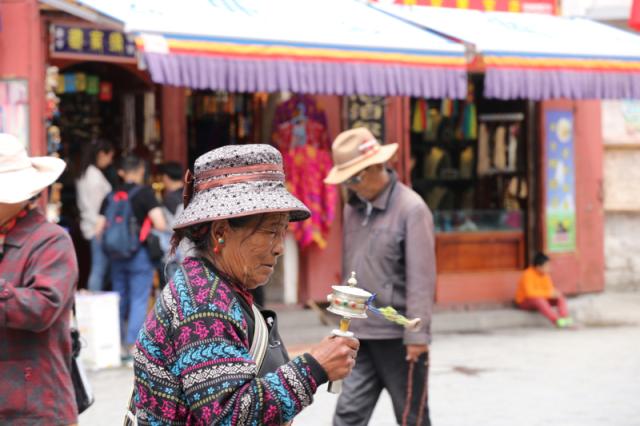Elderly woman in street