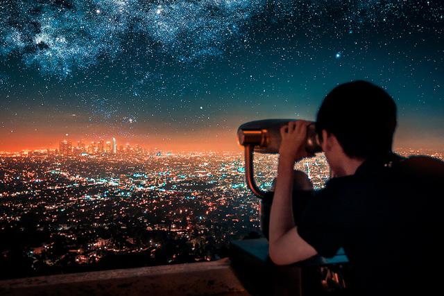 Man looking at starry sky