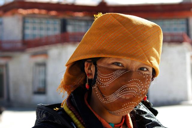 Portrait of woman in a mask