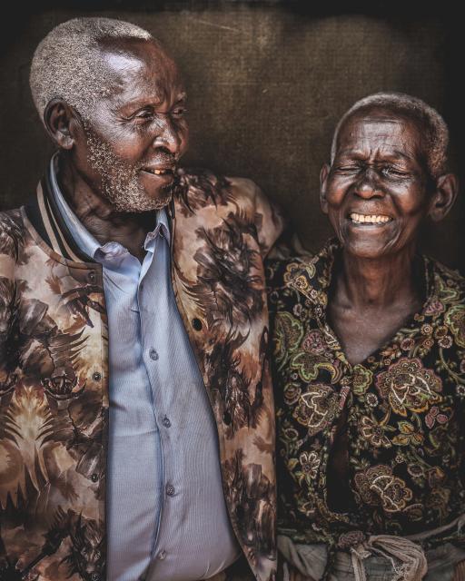 Old Ugandan man and his wife