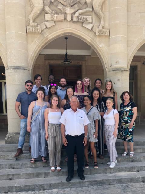 Group of students in front of a building in Cyprus.