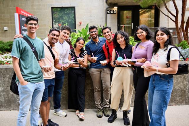 Group of students holding ice cream cups