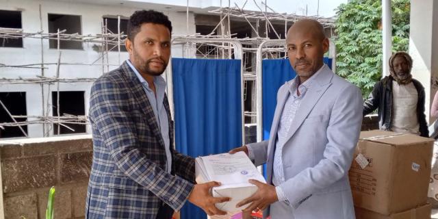 Desalegne Degefaw providing supplies to a hospital.