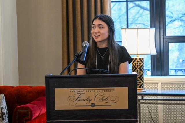 Woman speaking at podium