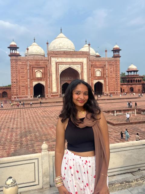 Woman standing in front of building