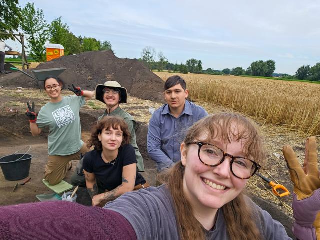 Selfie of group at archaeology site