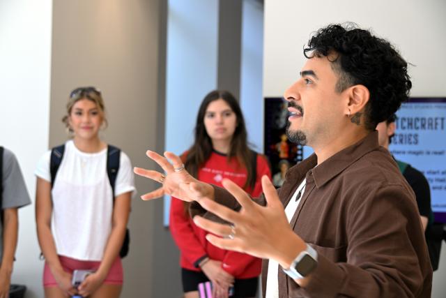 Man speaking with animated hand gestures