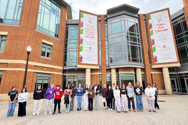 Students pose in a line outside of Ohio Union.