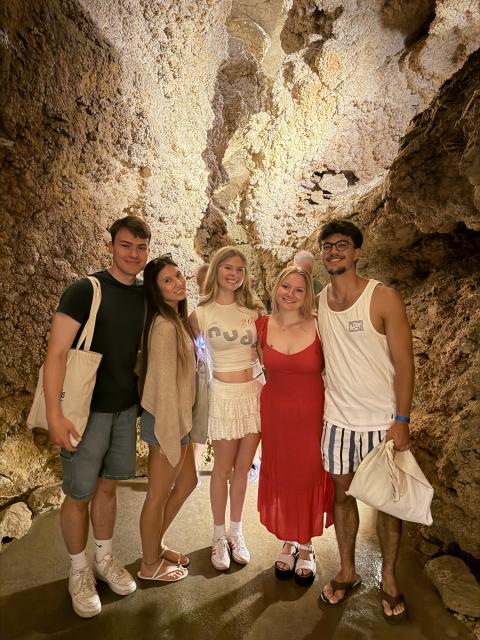 Students in a cave