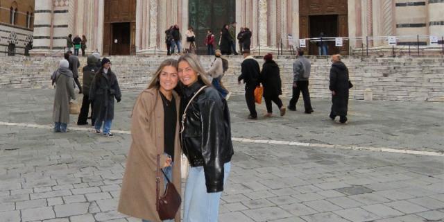 Students in front of building in Italy