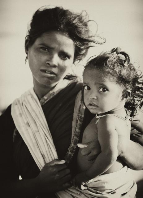 Young Indian woman with a baby