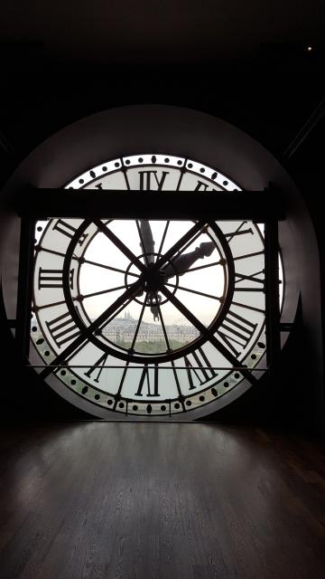 Large clock outlooking city