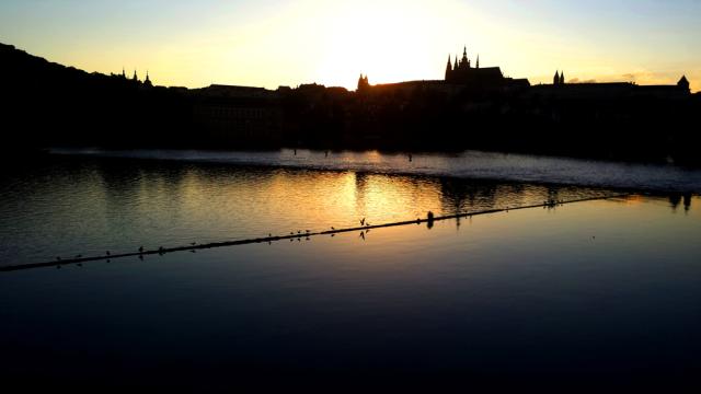 Sunset over the river with city background