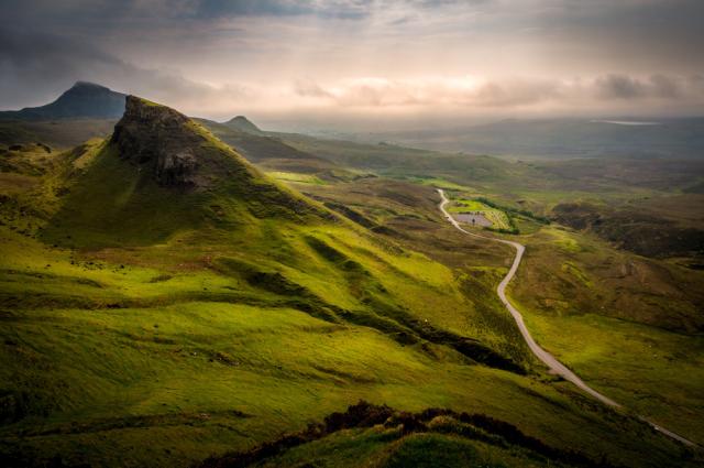 Serene landscape of green mountains.