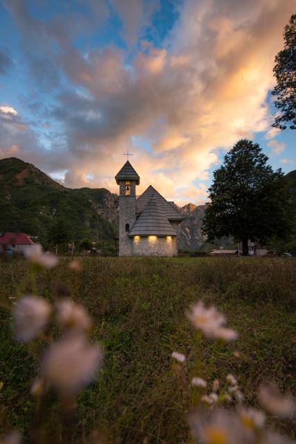 Low angle photo of a village church in Albania.