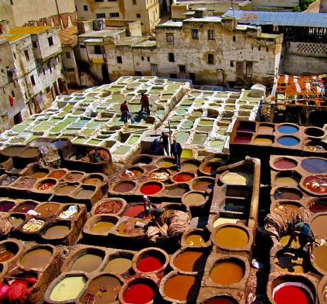 Bins of colored dyes.