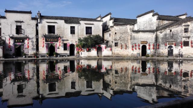 buildings along body of water