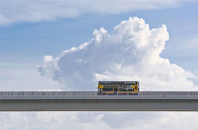 Bus driving on bridge