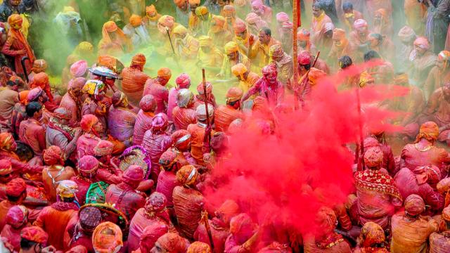Large group of people in bright colored clothes 