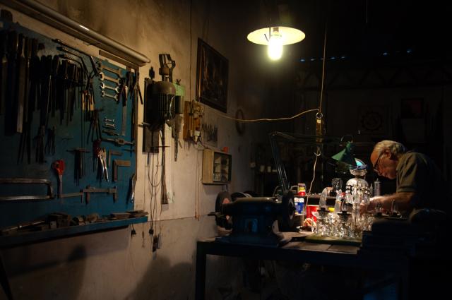 Male works in his workshop.