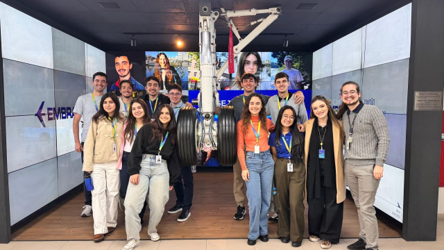Students at Embraer pose