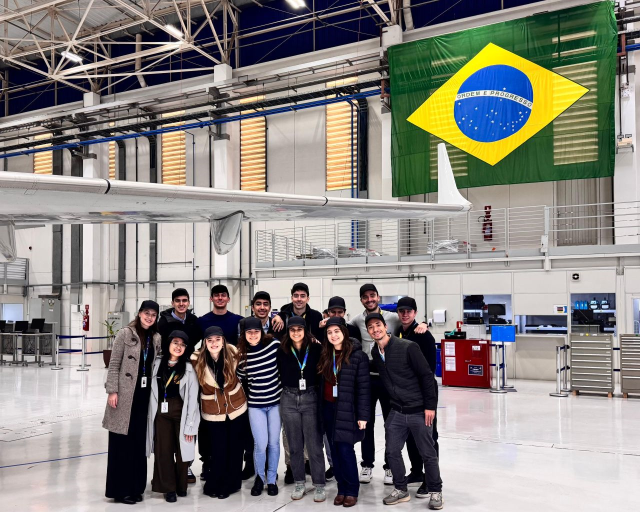 Students at Embraer pose